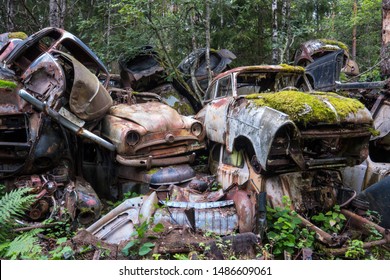 Abandoned Cars At Cementery In Forest Of Bastnäs In Sweden