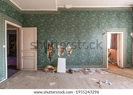 Abandoned castle, room with green retro wallpaper