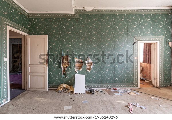 Abandoned castle,\
room with green retro\
wallpaper