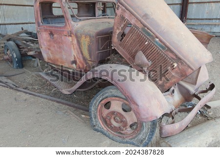 Abandoned Classic Pick Up Truck Rusting in a Barn with Flat Tires Model T, Ford, on a Condemned Ranch in California
