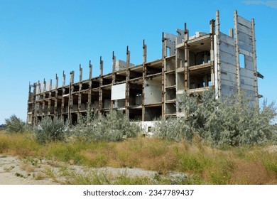 Abandoned construction  Ruins building and reinforced concrete frame                                