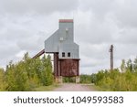 Abandoned copper mine with rock house ruins positioned mid-frame.  Centennial #6 mine in the Keweenaw Peninsula of Upper Michigan, an area known as the Copper Country.  Room for copy if needed.