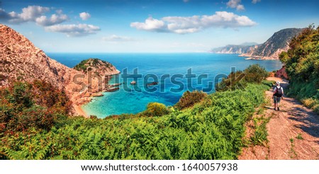 Abandoned country road to Agia Eleni beach. Amazing morning seascape of Mediterranean Sea. Beautiful outdoor scene of Cephalonia island, Greece, Europe. Traveling on Ionian Islands. 