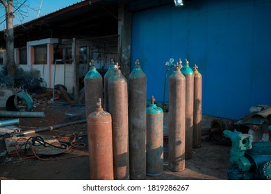 Abandoned Cylinders With Technical Gases, Fragment Of Cylinder With Oxygen. Tanks For Liquid Oxygen.