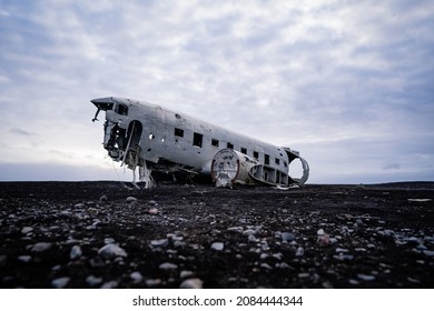 The abandoned DC-3 Airplane on Solheimasandur beach. Airplane wreckage on black sand beach. Douglas Dakota DC3, US navy, South Iceland. 2021
