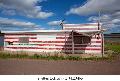 Abandoned, Deserted Red And White Seafood Shack.