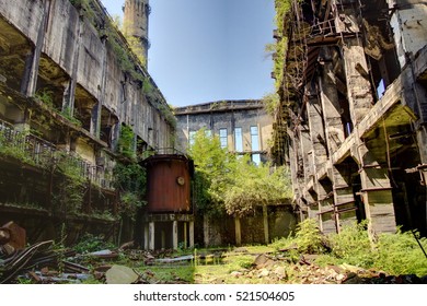 Abandoned, Destroyed By War And Overgrown Machinery Of Tkvarcheli Power Plant, Abkhazia, Georgia