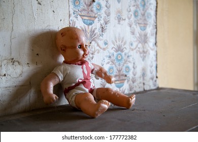 Abandoned Doll Toy In A  Discarded House