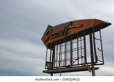 An abandoned drive in theater sign. 