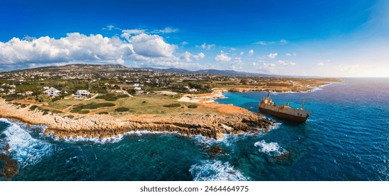 Abandoned Edro III Shipwreck at seashore of Peyia, near Paphos, Cyprus. Historic Edro III Shipwreck site on the shore of the water in Cyprus. Aerial view of Shipwreck EDRO III, Pegeia, Paphos. - Powered by Shutterstock