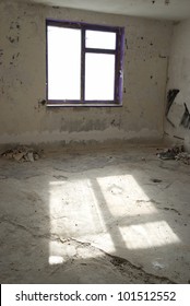 Abandoned empty room with window and light from it