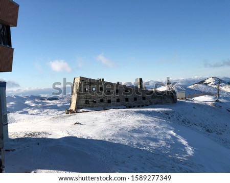 abandoned facility at the top of a mountain