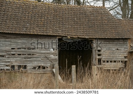 abandoned farm barn outbuildings in a state of disrepair