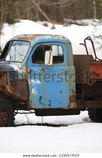 Abandoned Farm and Rusty\
Truck in Winter