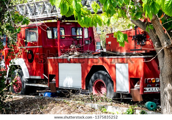 Abandoned fire truck in\
vehicle removal.