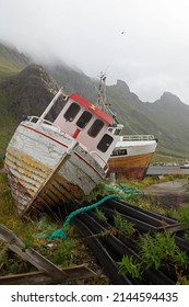 Abandoned Fishing Boats Rest Near a  Harbor on The Lofoten Islands, Norway