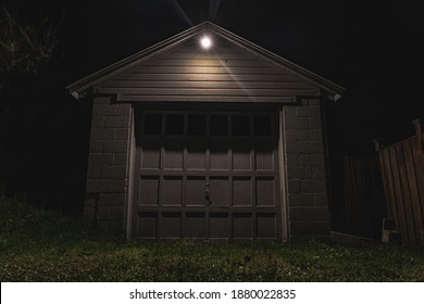 Abandoned garage with foreboding gloom and doom vibes - Shutterstock ID 1880022835