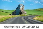 Abandoned grain elevator on roadside in Palouse Washington