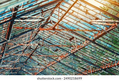 Abandoned greenhouse. The roof of old greenhouse with rusted metal ceilings and broken windows - Powered by Shutterstock