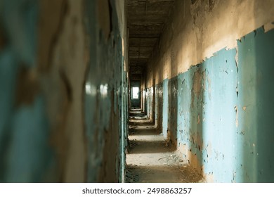 Abandoned Hospital Corridor With Peeling Paint and Dusty Floors in Autumn Light. - Powered by Shutterstock