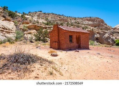 Abandoned House In The Desert Landscape
