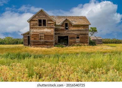 Abandoned House Outside Swift Current, SK With Grass In The Foreground