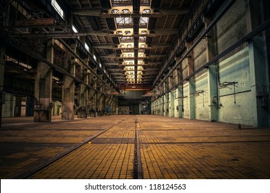 An abandoned industrial interior in dark colors