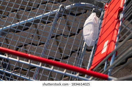 Abandoned KN95 Medical Protection Mask On A Shopping Cart In The Park Yard