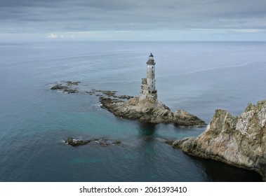 Abandoned Lighthouse Aniva on the Rock in Sakhalin Island, Russia. Aerial View.