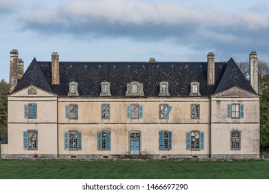 An Abandoned Mansion In The Field