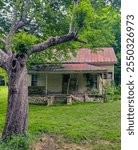 Abandoned millhouse or sharecropper style cottage in the woods