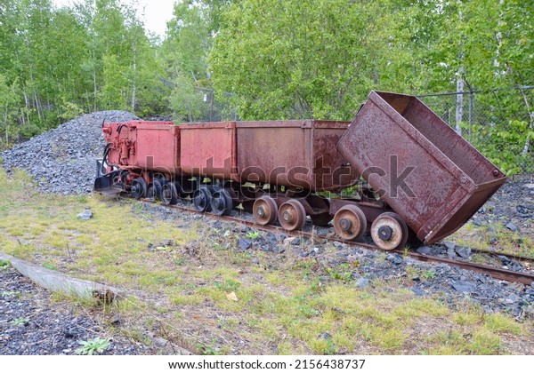 Abandoned mining carts and track in Cobalt area\
during Summer