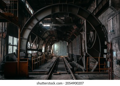 Abandoned mining facility equipment. Industrial interior - Shutterstock ID 2054900207