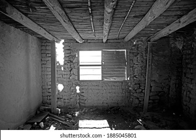 Abandoned Mudbrick Building Slowly Succumbs To Nature

