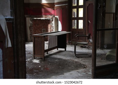 Abandoned Office Space Chair And Table