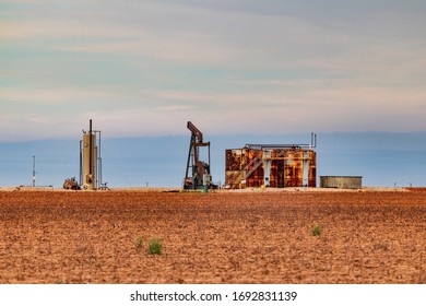 Abandoned Oil Well And Storage Tanks