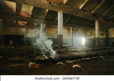 Abandoned Old Factory Hall Scene With Smoke And Messy Interior