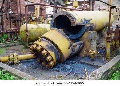 Abandoned old industrial equipment and machinery at a scrap yard. - Powered by Shutterstock