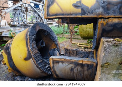 Abandoned old industrial equipment and machinery at a scrap yard. - Powered by Shutterstock