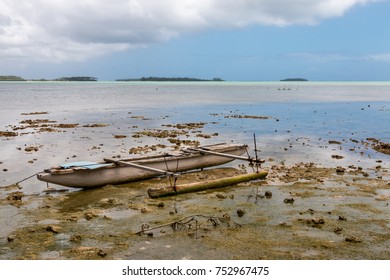 Abandoned Old Outrigger Canoe On Shallow Water, Tongatapu Island, Tonga