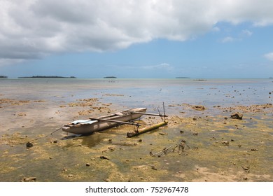 Abandoned Old Outrigger Canoe On Shallow Water, Tongatapu Island, Tonga