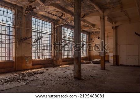 An abandoned old red brick factory - a spinning mill in Poland
