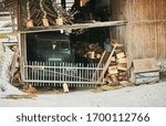 abandoned old retro car in wooden barn building