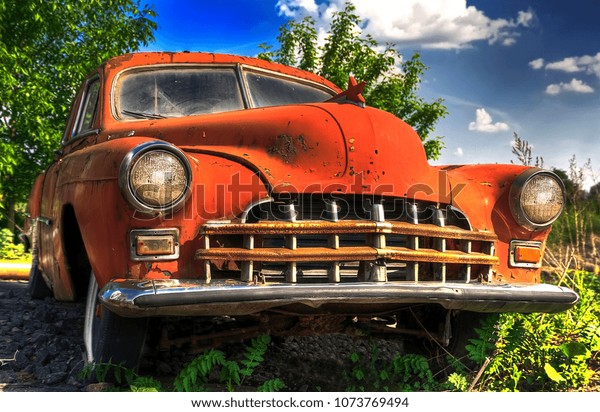 The\
abandoned old Soviet car of the times of the\
USSR