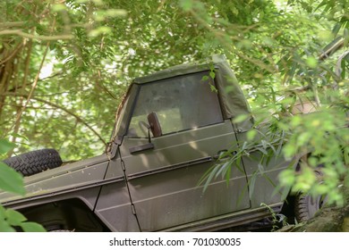 Abandoned old SUV in impenetrable tropical jungle - Powered by Shutterstock