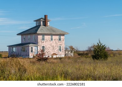 Abandoned Pink House near Plum Island and Newburyport Massachusetts is a beloved local landmark
 - Shutterstock ID 2226802181
