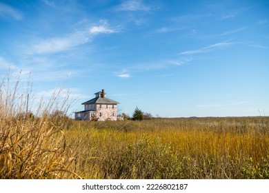 Abandoned Pink House near Plum Island and Newburyport Massachusetts is a beloved local landmark
 - Shutterstock ID 2226802187