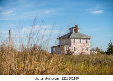 Abandoned Pink House near Plum Island and Newburyport Massachusetts is a beloved local landmark
 - Shutterstock ID 2226802189