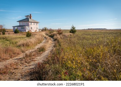 Abandoned Pink House near Plum Island and Newburyport Massachusetts is a beloved local landmark
 - Shutterstock ID 2226802191