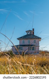 Abandoned Pink House near Plum Island and Newburyport Massachusetts is a beloved local landmark
 - Shutterstock ID 2226802195